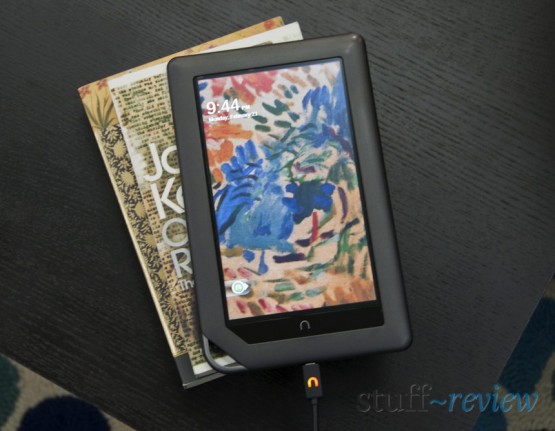 Nook Color ~ Hardware ~ Charging with USB cable on a pile of books Nook Color ~ Hardware ~ Charging with USB cable on a pile of books
