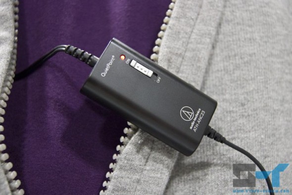 Audio-Technica ATH-ANC23 control unit clipped on clothing Audio-Technica ATH-ANC23 control unit clipped on clothing