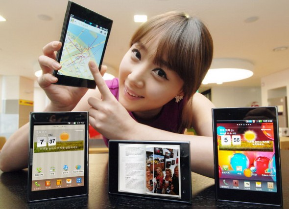 LG Optimus Vu 5.3-inch Android smartphone held by model pointing to maps LG Optimus Vu 5.3-inch Android smartphone held by model pointing to maps