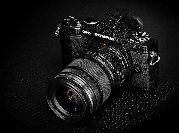 Olympus OM-D E-M5 wet - water drops dripping off Olympus OM-D E-M5 wet - water drops dripping off